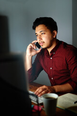 Leinwandbilder - Man, computer and night with phone call in office for communication on working late, deadline and networking. Male employee, dark and conversation for feedback on project, workplace and discussion.