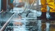 © PaulShlykov - Wet cleaning of street with pressurized water.