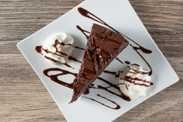 Wall Mural - A top down view of a slice of chocolate cake.