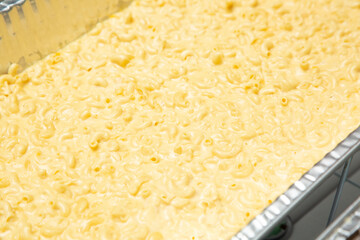 Wall Mural - A view of a catering tray of mac n cheese.