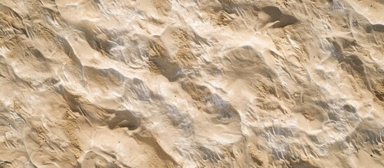 Canvas Print - Top view of a sandy beach background showcasing its sand texture, suitable for mockups and advertising purposes.