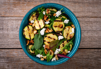 Wall Mural - Healthy vegetarian food . Grilled green zucchini salad . . Food background