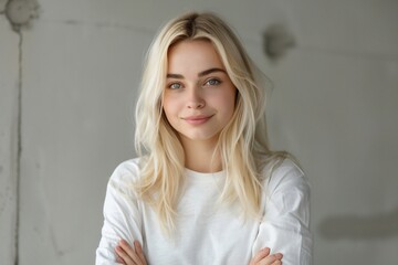 Wall Mural - Smiling Blonde Woman with Green Eyes and White Shirt