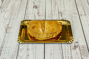 Wall Mural - Empanadillas are pastries made from a sweet or savory dough, filled with various ingredients such as meat,