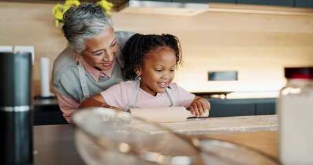 Canvas Print - Child, grandmother and bake in kitchen in house, bonding and teaching culinary skills with family home. Happy, education and girl rolling dough on table, excited and development in apartment