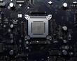 © Preeyanuch - Enhance the realism of this image of a computer motherboard. Make the details of the circuitry and components more visible and realistic.