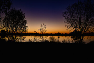 Sticker - Sunset over a wetland lake