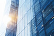 © song - Glass-Walled Office Building Facade Background