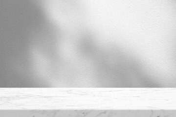 Canvas Print - White Marble Table with Tree Shadow in the Garden on Concrete Wall Texture Background