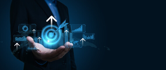 Businessman hand show analyzing sustainability company growth target with digital virtual graphics, financial data for long term investment..