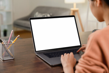 Aufkleber - Woman hand using laptop and type on the keyboard, Mockup screen of advertisement.