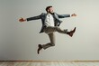 © rushay - Businessman wearing suit jumping