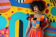 © kvladimirv - Colorful Fashion Portrait: Woman Posing Against Bright Geometric Mural