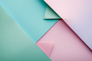 Poster - Soft pastel background with pink, blue, and green gradient featuring a triangular paper shape for copy space in the view from above.


