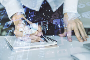 Aufkleber - Multi exposure of abstract software development hologram and hand writing in notebook on background with laptop, research and analytics concept