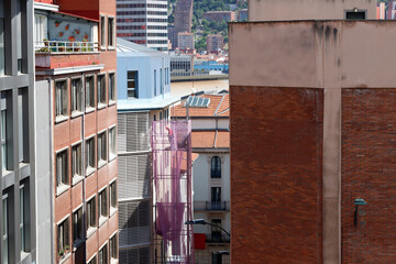 Wall Mural - Worker on a scaffolding