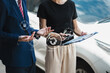 © NINENII - Insurance concept, insurance agent checking broken car and submit a claim form after an accident traffic accident