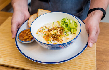 Poster - Rice porridge with caramelized onions and sesame seeds