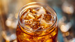 © Евгений Архипов - Close-up of a cold brew coffee with ice cubes in a mason jar