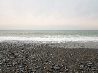 Wall Mural - gray nature background. empty beach and sea
