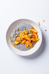 Canvas Print - Chia pudding with caramelized apricot, maple syrup and pistachio.