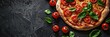 © Vlad - Fresh Italian Pizza with Tomatoes and Basil on Dark Background
