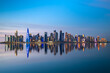 © hasan - The Panoramic skyline of Doha, Qatar during sunset