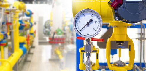 Poster - gas equipment. yellow pipes with monometer. pressure sensor on pipeline. gas distribution station fr