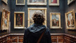 © Gita - A man with curly hair stands in front of paintings in an art gallery, appreciating the artwork. Ideal for themes of art, culture, and contemplation.