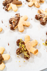 Wall Mural - Making Holiday Star Cookies, Chocolate-Dipped with Pistachio Topping