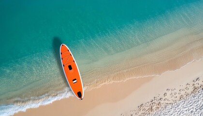 Wall Mural - A colorful paddleboard on the beach, with an orange colorway