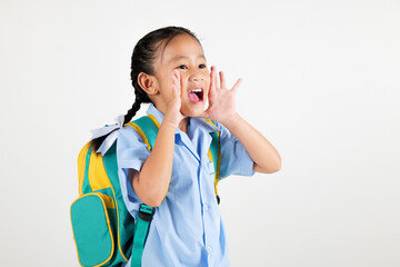 Wall Mural - Portrait smile Asian little girl kindergarten hold hands open mouth make shout speak loud announcement studio isolated white background, happy woman kid wear school uniform screaming, back to school