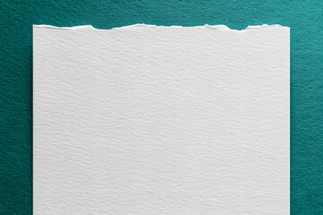 Wall Mural - texture of craft white color paper background with emerald border, macro. vintage dense kraft teal c