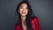 © AlfaSmart - A studio portrait of a stylish Asian woman dressed in luxurious clothing