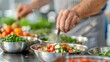 © SuriyaPhoto - A super sharp image of a multicultural group enjoying a cooking class