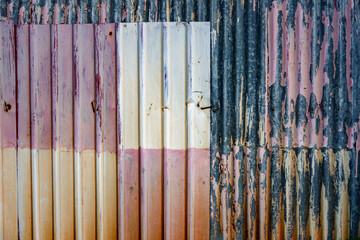 Wall Mural - A wall with a faded American flag on it