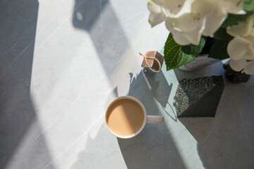 Sticker - Cup of coffee with milk on the table at home