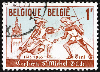 Wall Mural - Postage stamp Belgium 1963 swordsmen and Ghent belfry, 350th anniversary of the granting of a charter to the Ghent guild of fencers