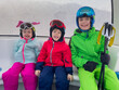 © Sergey Novikov - Kids in colorful ski gear, smile, ready for fun day on the slope