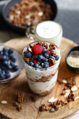 Wall Mural - Overnight oat with berries and white yogurt in a glass