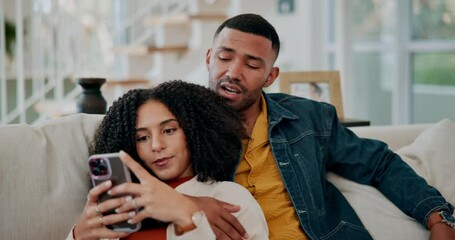 Poster - Black couple, hug and phone for social media in home, speaking and planning vacation online. People, embrace and reading ebook on weekend or relax on couch, support and app for streaming online