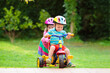© famveldman - Two children riding bikes
