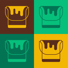 Sticker - Pop art Paint bucket icon isolated on color background. Vector