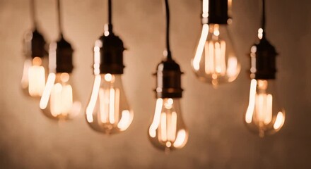 Wall Mural - Row of vintage Edison bulbs hanging from the ceiling glowing with warm filament light Set against a blurred neutral background creating an industrial and nostalgic atmosphere 4k animation