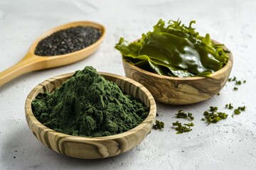 Poster - Spirulina powder and seaweed on wood plate and white table backgrounds