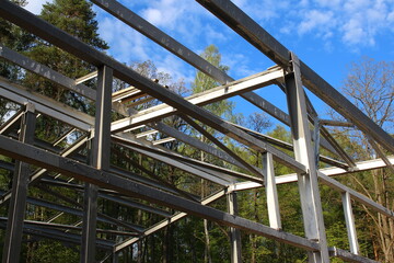 Frame of an industrial building made of welded metal beams