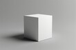 © Azhorov - A single, clean, white cube sits on a gray surface. Generative AI