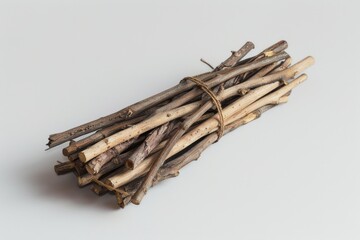 Poster - A bunch of wooden sticks lying on a white surface