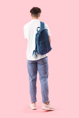 Sticker - Male student with backpack on pink background, back view