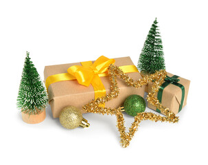 Wall Mural - Gift boxes with decorative Christmas trees and toys on white background